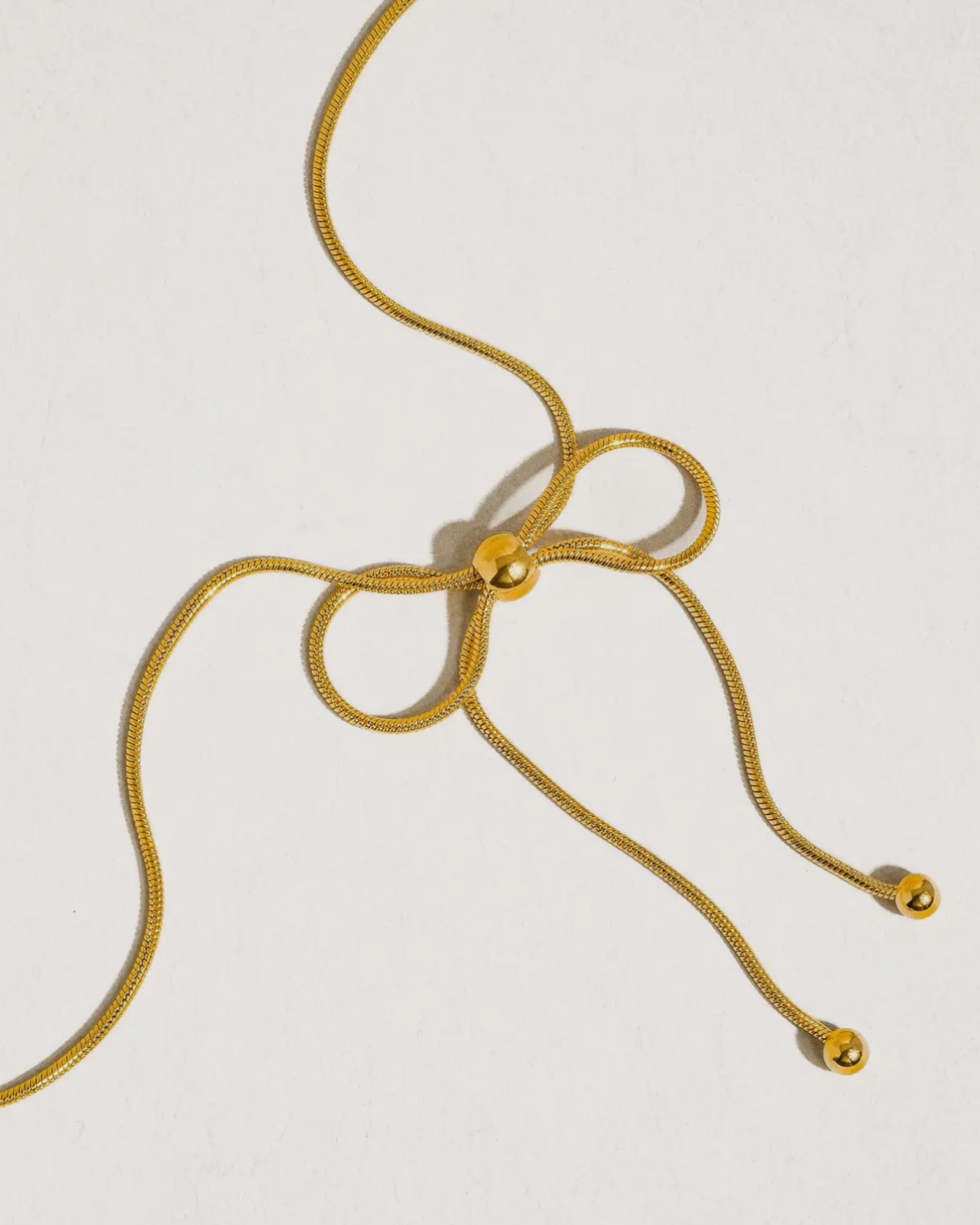Long Bow Necklace
