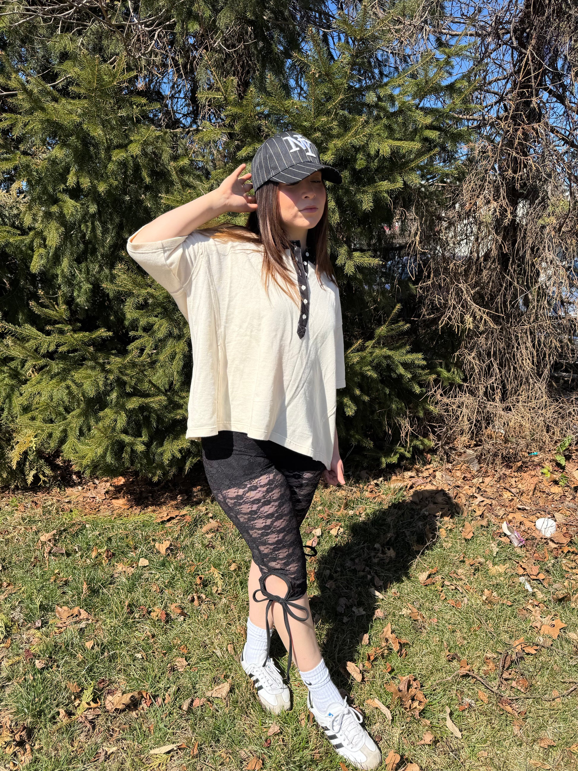 Elevate your everyday wardrobe with this stylish and comfortable cotton vanilla  creme tee. Features a Terry cotton blend fabrication and black denim contrast accents with functional buttons. Vintage style wash. 100% COTTON